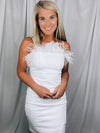 Dress features a solid base color, mini length, fitted fit, sleeveless detail, feathered detailing and runs true to size! -white