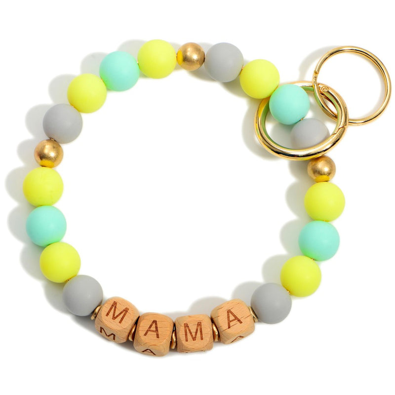 Wooden Beaded Key Ring Featuring Block Letters that Say "Mama".  - Holds Keys - Can Wear on Wrist, Attach to Bags or Purses - Approximately 3.5" in Diameter- PINK