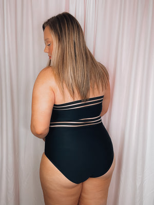 Behold 'Sunshine On My Mind' One Piece Swimsuit! Rock a black color that never goes out of style, plus a tie halter neck and mesh detailing for those who like to be extra. And don’t forget the full coverage bottoms so you can feel like a beach bab without any worries! Get your own one-piece piece of paradise today!