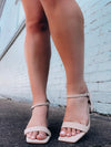 Heels feature a nude color, cross toe strap, low heel, ankle strap detail and runs true to size! 
