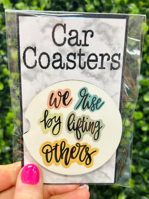 Don't let the road put a damper on your spirits - lift yourself up with this wise reminder! With its inspiring "We Rise By Lifting Others" message and its practical car coaster form, it's the perfect pick-me-up (or gift!) for anyone on the go.