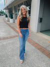 -Ladies we have you set when it comes to denim flares. They are the perfect piece to add to your everyday wear!  Stretchy and pull on call for a comfy and stylish fit!  -Functional Back Pockets  -30" Inseam...Squat Approval..Runs true to size-  Aubree is wearing a size XL and wears a size 13 in our cello jeans. 