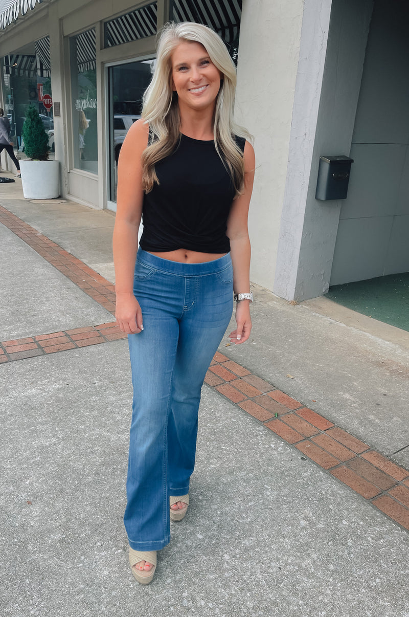 -Ladies we have you set when it comes to denim flares. They are the perfect piece to add to your everyday wear!  Stretchy and pull on call for a comfy and stylish fit!  -Functional Back Pockets  -30" Inseam...Squat Approval..Runs true to size-  Aubree is wearing a size XL and wears a size 13 in our cello jeans. 