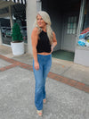 -Ladies we have you set when it comes to denim flares. They are the perfect piece to add to your everyday wear!  Stretchy and pull on call for a comfy and stylish fit!  -Functional Back Pockets  -30" Inseam...Squat Approval..Runs true to size-  Aubree is wearing a size XL and wears a size 13 in our cello jeans. 