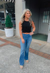 -Ladies we have you set when it comes to denim flares. They are the perfect piece to add to your everyday wear!  Stretchy and pull on call for a comfy and stylish fit!  -Functional Back Pockets  -30" Inseam...Squat Approval..Runs true to size-  Aubree is wearing a size XL and wears a size 13 in our cello jeans. 