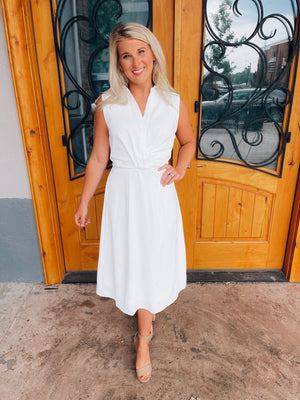 Look no further than the Peaceful Love Midi Dress for the perfect bridal outfit! With its sleek white construction, sleeveless design, V-neckline, and elastic waist band, this collared midi dress is a fan favorite. Make it yours and make 'em swoon!