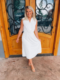 Look no further than the Peaceful Love Midi Dress for the perfect bridal outfit! With its sleek white construction, sleeveless design, V-neckline, and elastic waist band, this collared midi dress is a fan favorite. Make it yours and make 'em swoon!