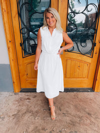 Look no further than the Peaceful Love Midi Dress for the perfect bridal outfit! With its sleek white construction, sleeveless design, V-neckline, and elastic waist band, this collared midi dress is a fan favorite. Make it yours and make 'em swoon!