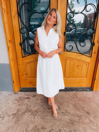 Look no further than the Peaceful Love Midi Dress for the perfect bridal outfit! With its sleek white construction, sleeveless design, V-neckline, and elastic waist band, this collared midi dress is a fan favorite. Make it yours and make 'em swoon!