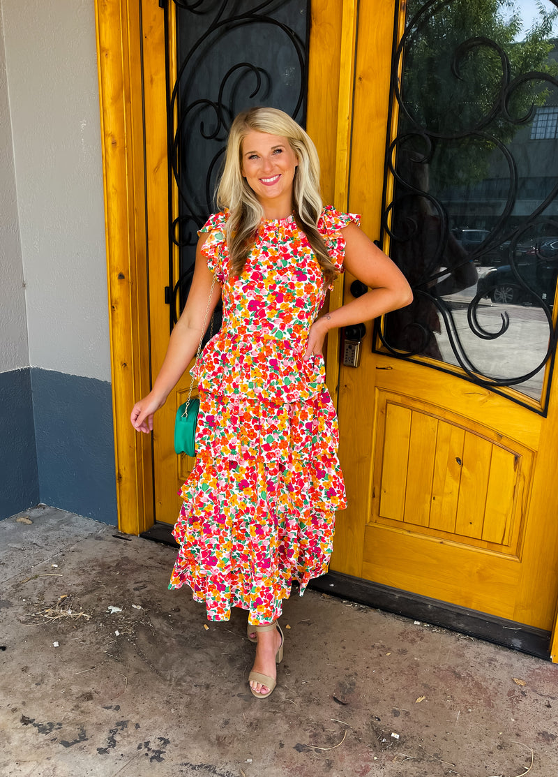 Live out your dream date in this sassy yet classy Dreamy Date Midi Dress! Featuring a round neckline, a floral print, and a tiered bottom, you'll be the talk of the town in this midi length cutie! Plus the back zip up closure for a snug and flattering fit! Perfect for any occasion, it's time to get ready for a night out with your BFFs. Now, let's get our midi on!