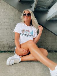 Catch the game day vibe with this vintage football tee! Show off your love of the sport with this one-of-a-kind, short-sleeved graphic tee featuring football characters and a cool, retro vibe. Unisex fit and fun graphics make this tee the perfect way to strut your stuff in style! Go team go!