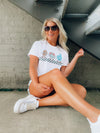 Catch the game day vibe with this vintage football tee! Show off your love of the sport with this one-of-a-kind, short-sleeved graphic tee featuring football characters and a cool, retro vibe. Unisex fit and fun graphics make this tee the perfect way to strut your stuff in style! Go team go!