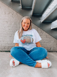 Get ready for touchdown season with this awesome unisex graphic tee! Show your spirit with this classic game day look featuring a football graphic and short sleeves – perfect for any football fanatics out there. TOUCHDOWN!!! 🏈