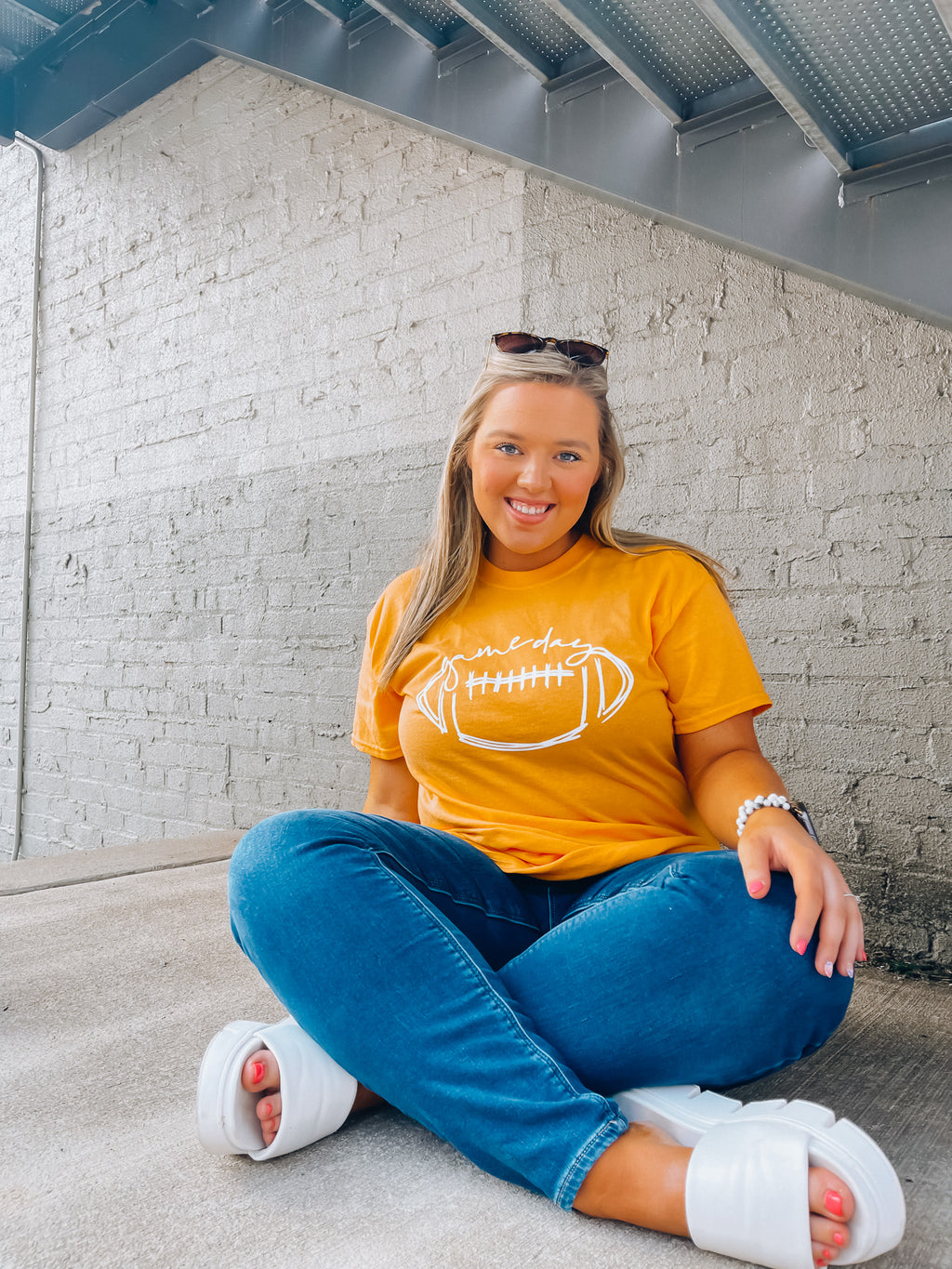 Score a touchdown in style with this Football Gameday Graphic Tee! Whether you're tailgating or watching from home, you'll be ready to cheer on your favorite team with this comfy, unisex design. This one's a surefire winner! Go long! ;)-MUSTARD