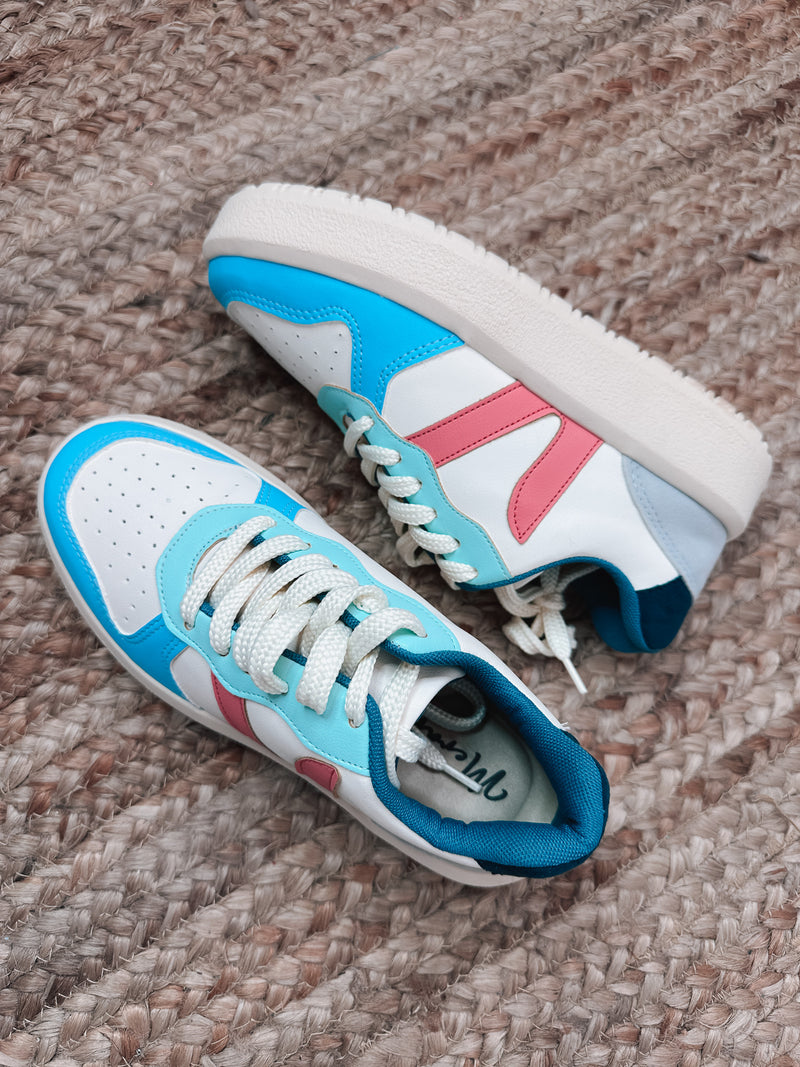 Step up your sneaker game with the ultra comfy Front Cover Vibes! This stylish lace-up sneaker is gonna have you flyin' down the street with a bright burst of blue and pink detailing. Plus, with memory foam insoles, you can strut in sophisticated style while enjoying cloud-like cushioning. Sizzle in cool style while your feet take a break!