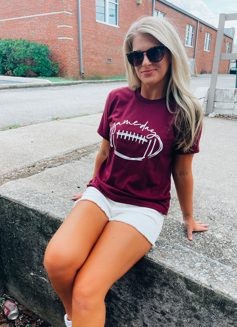 Score a touchdown in style with this Football Gameday Graphic Tee! Whether you're tailgating or watching from home, you'll be ready to cheer on your favorite team with this comfy, unisex design. This one's a surefire winner! Go long! ;)-BLACK