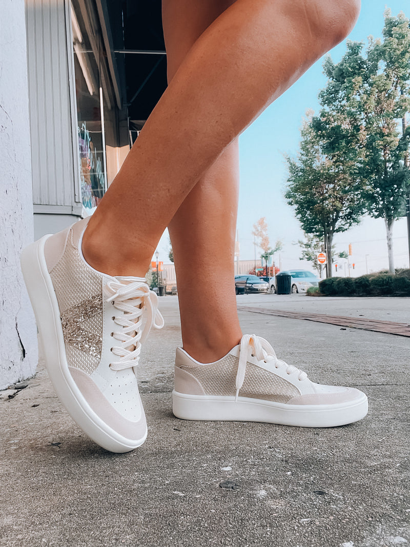 Elevate your style effortlessly with these Stride On Sneakers! They come with luxe gold sequin detailing, comfy memory foam, and traditional lace-up styling, so you can look great while feeling even better. Step out in style with these versatile sneakers!