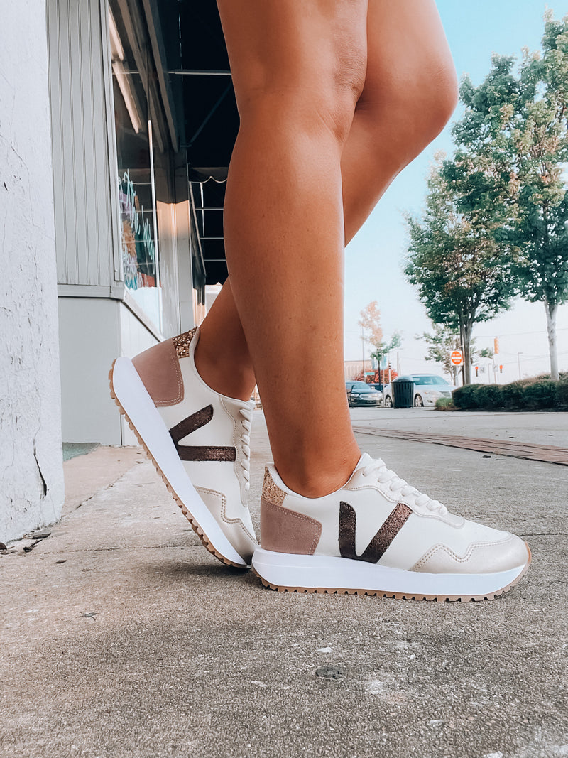 Experience the power of our Authentic Power Sneakers! These shoes have everything you need: comfortable memory foam insole, classic lace-up closure, and charming bronze sequin detailing. Plus, they come in an eye-catching combination of nude and bronze colors. Leave ‘em starstruck!