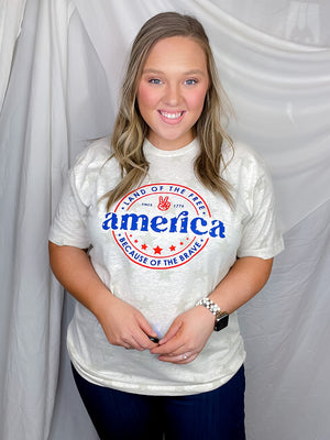 Celebrate America's independence in style with this Land of the Free Since 1776 Star Graphic Tee! The patriotic colors and star graphic tee make it a perfect choice for showing off your pride. Its unisex fit and short sleeves make it comfortable and versatile for all-day wear. Let freedom, and fashion, ring!