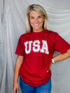 This fun USA Vintage Graphic Tee is sure to make a statement! Whether you're just showing a bit of patriot pride or you're ready to 'Murica it up, it's the perfect choice. With classic USA jersey lettering, short sleeves, and a unisex fit, you'll be stylish and comfy all day long!-red