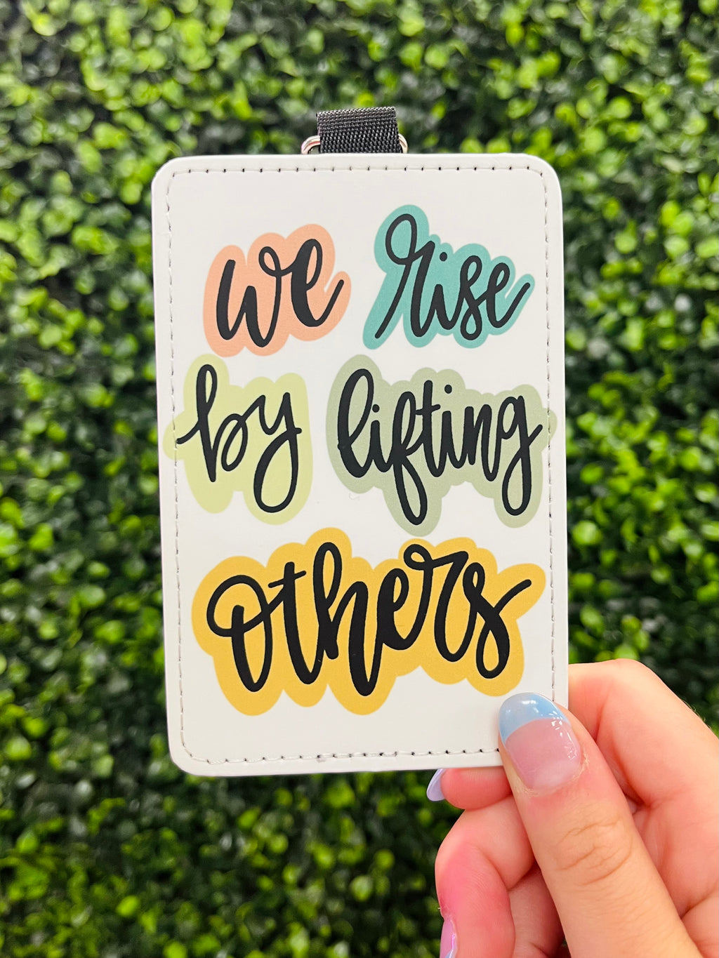 Forget leaving your friends and family in the dark—with our "We Rise By Lifting Others" Card Holder Keychain, you can light up their day every time you take out your keys! The inspirational quote will keep your spirits high, and the card holder feature will keep you from getting stuck in a tight spot! It's the perfect keychain for anyone who loves to stay organized!