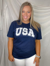 This fun USA Vintage Graphic Tee is sure to make a statement! Whether you're just showing a bit of patriot pride or you're ready to 'Murica it up, it's the perfect choice. With classic USA jersey lettering, short sleeves, and a unisex fit, you'll be stylish and comfy all day long!-navy