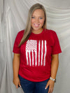 This patriotic tee will make any heart swell with pride! It features a distressed flag design with a bold, unisex fit and a classic round neckline. Honor your country in style with this must-have tee!-red