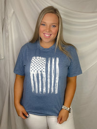 This patriotic tee will make any heart swell with pride! It features a distressed flag design with a bold, unisex fit and a classic round neckline. Honor your country in style with this must-have tee!-blue