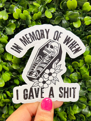 Say goodbye to the days when you "gave a shit" and say "hey!" to a sticker that says it all! Stick this coffin-design sticker anywhere that needs a humorous touch. It's a funny way to remember when life was much, much less stressful!