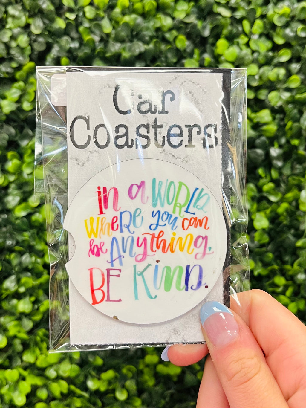Give that special someone an inspiring gift with our "In A World" Car Coaster! With its colorful cursive font and motivational message, it'll be a daily reminder to "be kind" no matter where the road takes them! It's the perfect way to brighten up any car interior (or their day!).