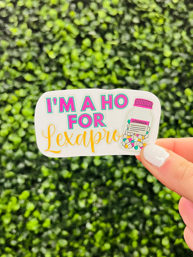 Introducing the "Ho For Lexapro" sticker  - featuring a cheeky pill bottle design with the humorous phrase "I'm a ho for Lexapro". Now you can let your sass speak louder than your medicine! Get yours today and rock this must-have decal!