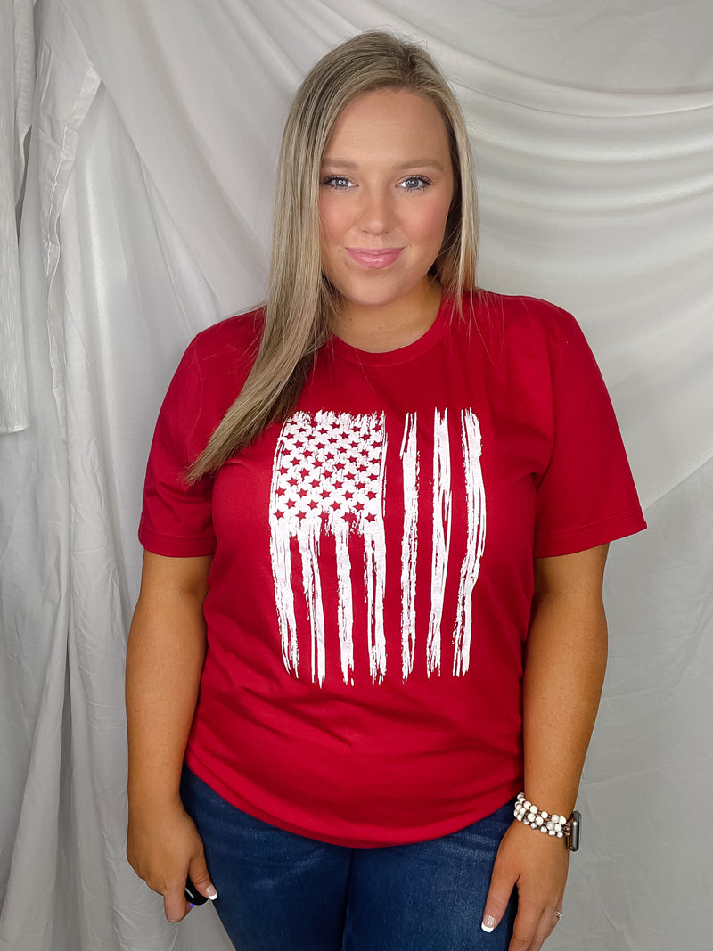 This patriotic tee will make any heart swell with pride! It features a distressed flag design with a bold, unisex fit and a classic round neckline. Honor your country in style with this must-have tee!-blue