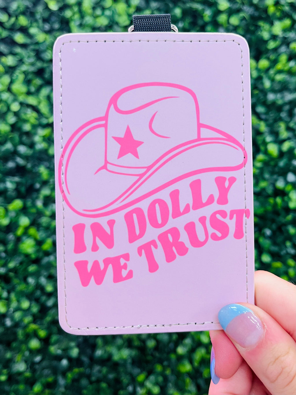 Are you looking for a way to keep your cards safe and express your love for Dolly Parton? Look no further: the In Dolly We Trust Card Holder Keychain is here! This stylish keychain with the trusty catchphrase is the perfect gift for any Dolly fan. So don't delay, trust in Dolly and get yours today!
