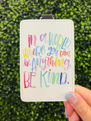 Be kind and carry your cards in style with the In A World Card Holder Keychain! This cute keychain says it best: in a world where you can be anything, be kind! Perfect for on-the-go, this inspirational and practical card holder will help you stay organized and motivated. So, why wait? Get one for your keychain today!