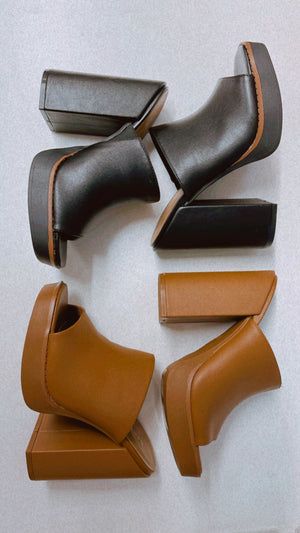 Heels feature a solid color, wide 5" block heel, wide toe strap detail and runs true to size!