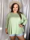 Top features a dolman sleeve, super soft ribbed material with a cuff sleeve and an oversized fit. -SAGE