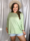 Top features a dolman sleeve, super soft ribbed material with a cuff sleeve and an oversized fit.-SAGE