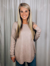 Top features a deep taupe color, dreamy soft material, long sleeves, boat neck line, hi-low hem and runs true to size! 