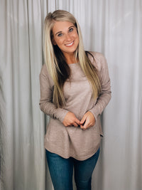 Top features a deep taupe color, dreamy soft material, long sleeves, boat neck line, hi-low hem and runs true to size! 