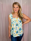 This Blooming Head To Toe Top is perfect for the summer months, boasting a bright and beautiful floral print atop a lightweight and airy fabric. This sleeveless top features a stylish ruffle hem and a flattering square neckline for a trend-right and fun look. The perfect mix of comfortable and stylish, the lightweight material of this top will keep you cool and fresh all day.-mint