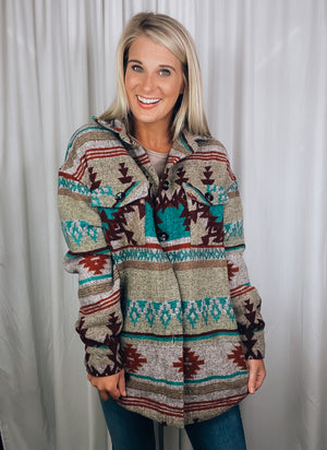 Shacket features a dreamy thick and warm material, long sleeves, functional button down detailing, open front, functional pockets, multi color aztec print and runs oversized!