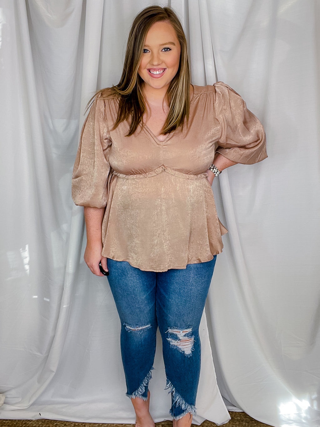 Bottoms feature a medium denim wash, front distressing, stretchy material, skinny leg fit and runs true to size!   *Aubree wore size 14 
