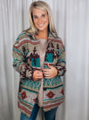Shacket features a dreamy thick and warm material, long sleeves, functional button down detailing, open front, functional pockets, multi color aztec print and runs oversized!