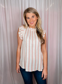 The Casual Chic Top is the perfect way to look fashionable without sacrificing comfort. Crafted from lightweight fabric and styled with short sleeves, a round neckline, and subtle striped details, this top offers an elegant look and feel. Elevated further by ruffle sleeves, the Casual Chic Top is sure to be a wardrobe staple.-sienna