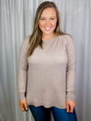 Top features a deep taupe color, dreamy soft material, long sleeves, boat neck line, hi-low hem and runs true to size! 