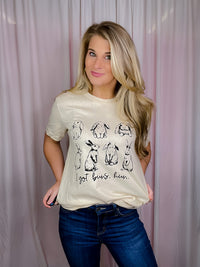 This I Got Buns Hun Tee is perfect for Easter! It features short sleeves, a round neckline, and an unisex fit, plus a playful bunny motif. The phrase 'Got Buns Hun' adds a fun, festive vibe. Get one now in sizes S-3XL!-oatmeal