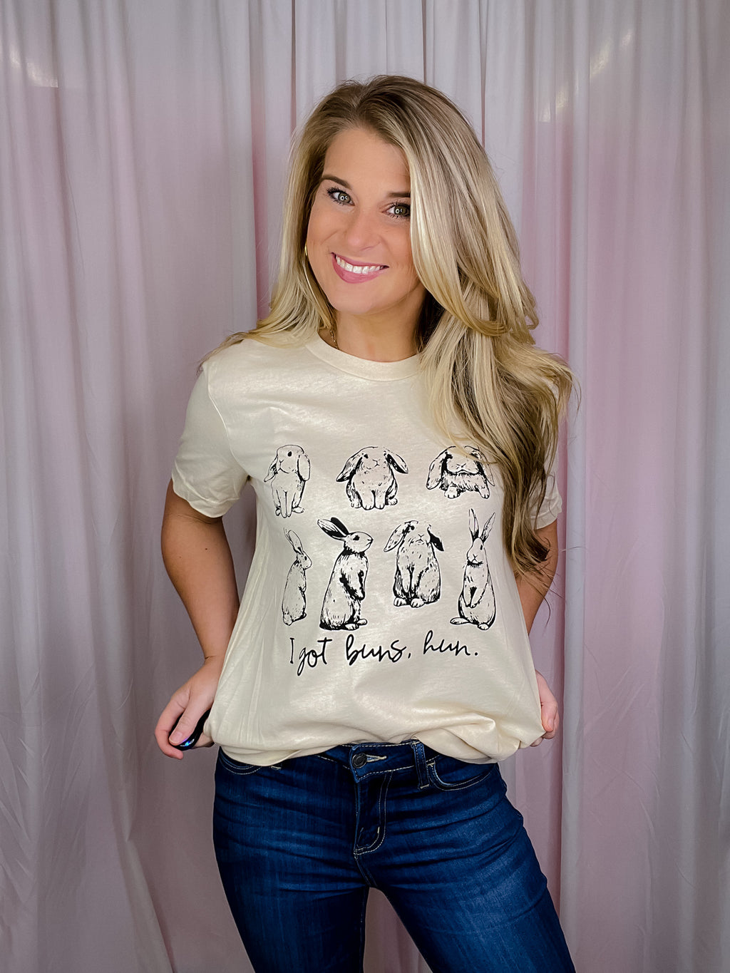 This I Got Buns Hun Tee is perfect for Easter! It features short sleeves, a round neckline, and an unisex fit, plus a playful bunny motif. The phrase 'Got Buns Hun' adds a fun, festive vibe. Get one now in sizes S-3XL!-oatmeal
