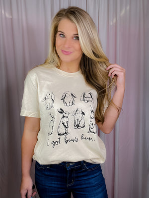 This I Got Buns Hun Tee is perfect for Easter! It features short sleeves, a round neckline, and an unisex fit, plus a playful bunny motif. The phrase 'Got Buns Hun' adds a fun, festive vibe. Get one now in sizes S-3XL!-oatmeal
