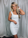 Dress features a solid base color, light blue striped detail, tank straps, lightweight material, and runs true to size! 