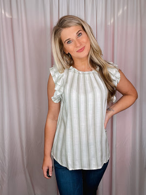 The Casual Chic Top is the perfect way to look fashionable without sacrificing comfort. Crafted from lightweight fabric and styled with short sleeves, a round neckline, and subtle striped details, this top offers an elegant look and feel. Elevated further by ruffle sleeves, the Casual Chic Top is sure to be a wardrobe staple.-olive